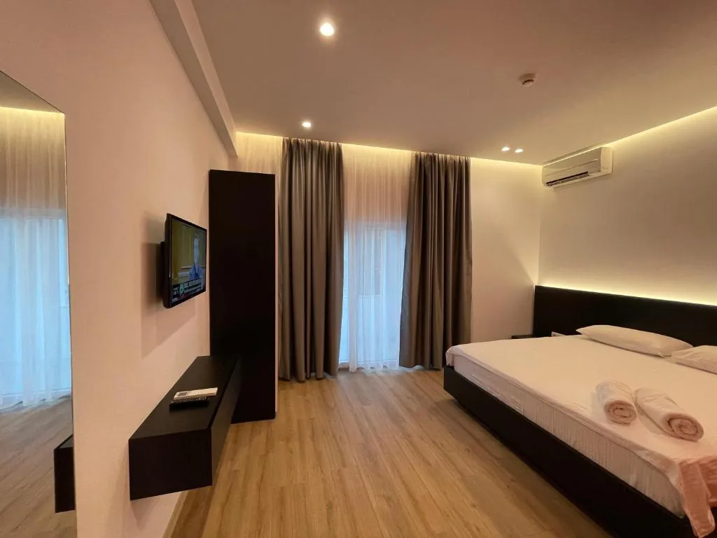 King Room with Balcony — Ladi Rooms